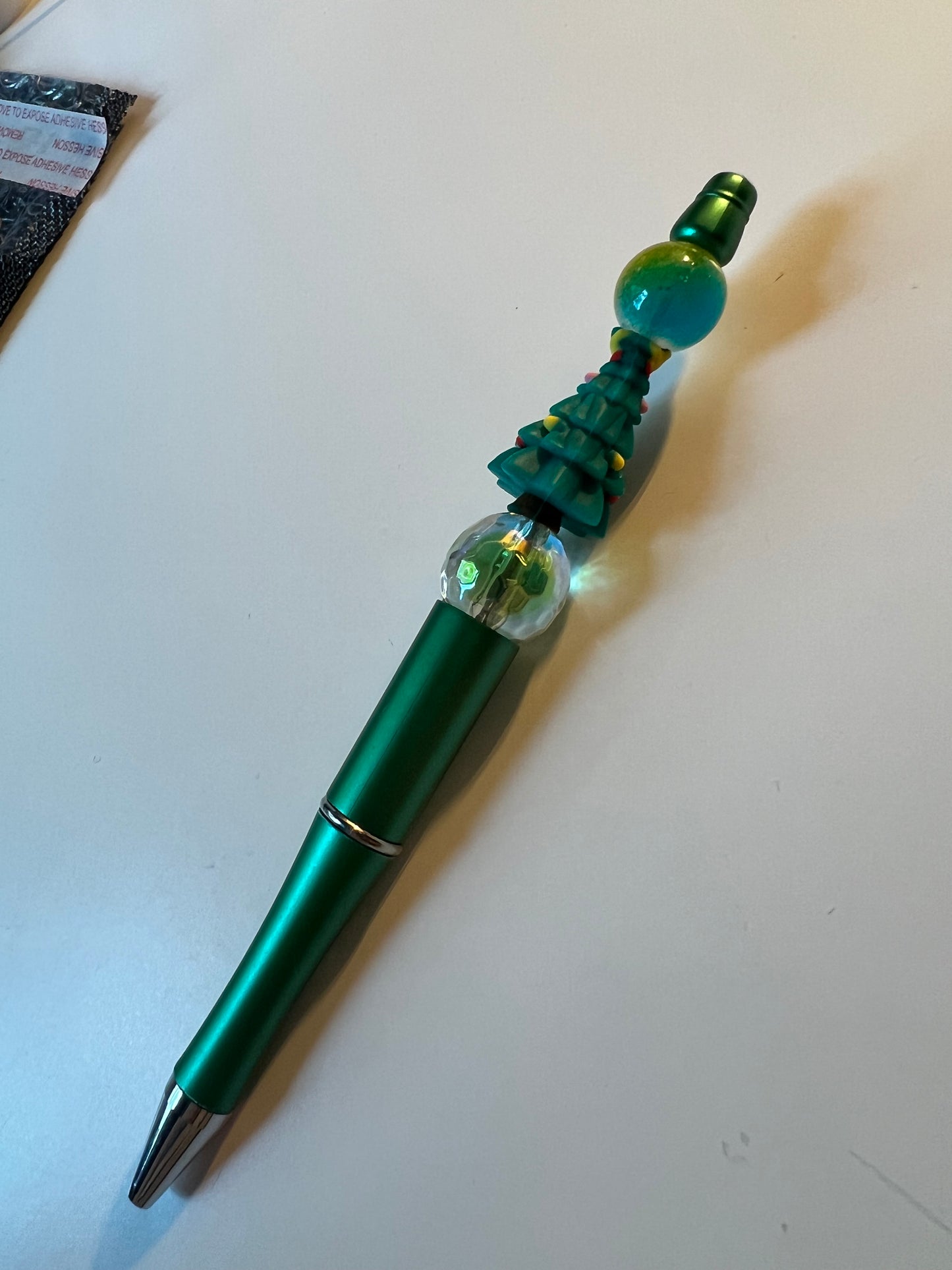 Kugelschreiber mit Perlen und Figuren